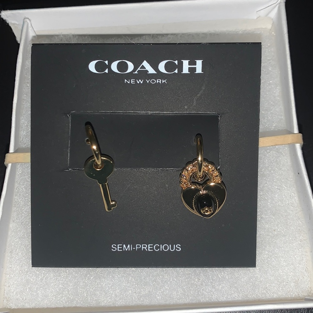 Brand new Coach earrings